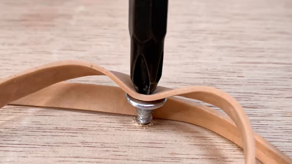 Rubber Band To Remove Stripped Screws