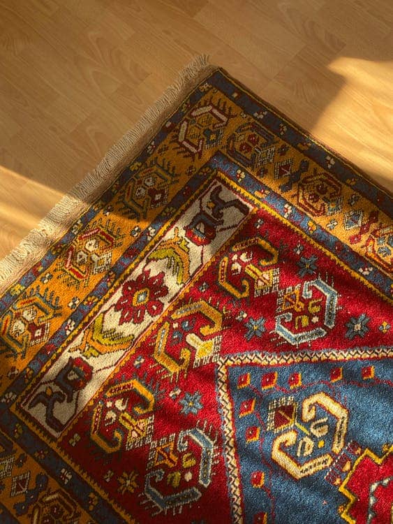 Free photo of decorated carpet on floor